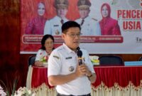 FOTO: Kepala Bidang Pengendalian Penduduk dan Keluarga Berencana, Yuyun Wahyudi saat membacakan sambutan kepala dinasnya pada sosialisasi pencegahan PAU di Bartim,