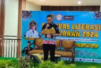 FOTO : Kepala Bidang PKP Edi Juardi menyampaikan sambutan Kadis Kominfosantik Kalteng Agus Siswadi. (IST)