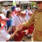 Halikinnor disambut siswa SD di Desa Sungai Hanya.(IST)