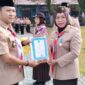 Ketua kharran Baamang terima penghargaan lencana pancawarsa.(IST)