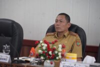 RAKOR : Staf Ahli Gubernur Bidang Ekonomi, Keuangan dan Pembangunan Yuas Elko saat mengikuti rakor pengendalian inflasi secara virtual bersama Menteri Dalam Negeri RI Tito Karnavian secara virtual dari Ruang Rapat Bajakah, Kantor Gubernur Kalteng, Senin (6/1).(IST)