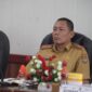 RAKOR : Staf Ahli Gubernur Bidang Ekonomi, Keuangan dan Pembangunan Yuas Elko saat mengikuti rakor pengendalian inflasi secara virtual bersama Menteri Dalam Negeri RI Tito Karnavian secara virtual dari Ruang Rapat Bajakah, Kantor Gubernur Kalteng, Senin (6/1).(IST)