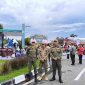 BERJAGA : Anggota Satpol PP Kalteng Berjaga disekitar lokasi acara National Halal Fair 2025 yang digelar di Jl. Brigjen Katamso, Palangka Raya, Kamis (6/3).(IST)