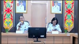 Kepala Dinas PM-PTSP Kalteng Sutoyo (Kiri).(IST)