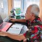 SOSIALISASI: Kepala UPT PP Kumai Aminudin
saat mengikuti sosialisasi pengelolaan cold storage secara daring melalui aplikasi zoom meting, Kamis (13/3).(IST)