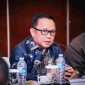 RAPAT : Kepala Dinas Energi dan Sumber Daya Mineral (ESDM) Provinsi Kalteng, Vent Christway saat mengikuti rapat belum lama ini.(IST)