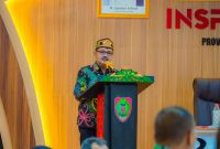 SAMBUTAN : Asisten Perekonomian dan Pembangunan Sekretariat Daerah Provinsi Kalteng Herson B. Aden saat menyampaikan sambutan Plt sekda provinsi Rapat Koordinasi Evaluasi Penyelenggaraan Pemerintahan Daerah Tahun 2025, Kamis (19/6).(IST)