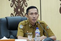 LAPORAN : Plt. Kepala Diskominfosantik Provinsi Kalteng Rangga Lesmana saat menyampaikan laporannya  saat sosialisasi yang dilaksanakan di Aula Kanderang Tingang, Diskominfosantik Kalteng, pada Selasa (3/6).(IST)