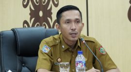 LAPORAN : Plt. Kepala Diskominfosantik Provinsi Kalteng Rangga Lesmana saat menyampaikan laporannya  saat sosialisasi yang dilaksanakan di Aula Kanderang Tingang, Diskominfosantik Kalteng, pada Selasa (3/6).(IST)
