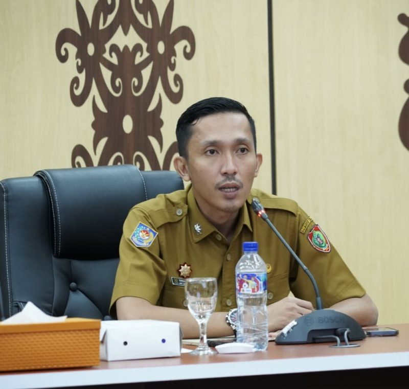LAPORAN : Plt. Kepala Diskominfosantik Provinsi Kalteng Rangga Lesmana saat menyampaikan laporannya  saat sosialisasi yang dilaksanakan di Aula Kanderang Tingang, Diskominfosantik Kalteng, pada Selasa (3/6).(IST)