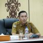 LAPORAN : Plt. Kepala Diskominfosantik Provinsi Kalteng Rangga Lesmana saat menyampaikan laporannya  saat sosialisasi yang dilaksanakan di Aula Kanderang Tingang, Diskominfosantik Kalteng, pada Selasa (3/6).(IST)