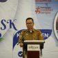 SAMBUTAN: Plt. Sekretaris Daerah Provinsi  Kalteng Leonard S. Ampung saat menyampaikan sambutannya pada acara Coaching Clinic 1 Implementasi SSK Program PPSP Kabupaten Kapuas dan Seruyan tahun 2025, Selasa (12/8/2025).(IST)