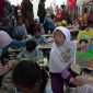 LOMBA: Peringatan Hari Anak Nasional tahun 2025 di Kecamatan MB Ketapang dilaksanakan lomba mewarnai untuk anak usia dini Rabu (30/7/2025).(IST)