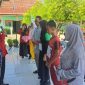 HADIRI : Kepala Seksi Kurikulum dan Penilaian Bidang Pembinaan SMP Disdik Kotim, Herman Yudianto saat menghadiri acara di SMPN 4 Sampit belum lama ini.(IST)