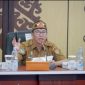 SOSIALISASI : Plt. Sekretaris Daerat Provinsi Kalteng Leonard S. Ampung saat menyampaikan sambutannya saat Sosialisasi Aplikasi KHBS Tahun 2025 yang digelar di Aula Kanderang Tingang, Diskominfosantik Provinsi Kalteng, Selasa (30/12/2025).(IST)