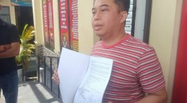 LAPORKAN : Ketua DPRD Kotim, Rimbun, saat  melaporkan korlap aksi unjuk rasa ke Polres Kotawaringin Timur pada Sabtu (15/2/2026).