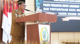 PIDATO : Wakil Bupati Lamandau, Abdul Hamid, saat menyampaikan pidato pengantar Ranperda tentang LPJ Pelaksanaan APBD Tahun Anggaran 2025 pada Rapat Paripurna I Masa Sidang III Tahun Sidang 2025/2026 DPRD Kabupaten Lamandau, Senin (22/6/2026).